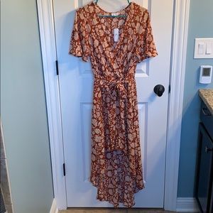 a red, floral high-low dress